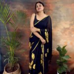 Bold and Classic Black Saree with Golden Hand Painted Golden Flowers